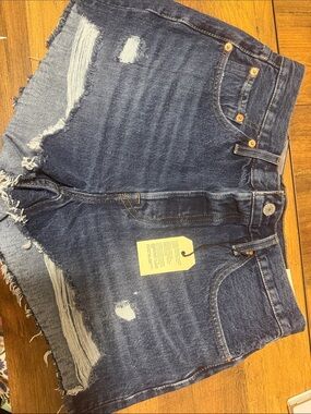 Levi’s size 29 501 Dark Blue Distressed Denim Shorts